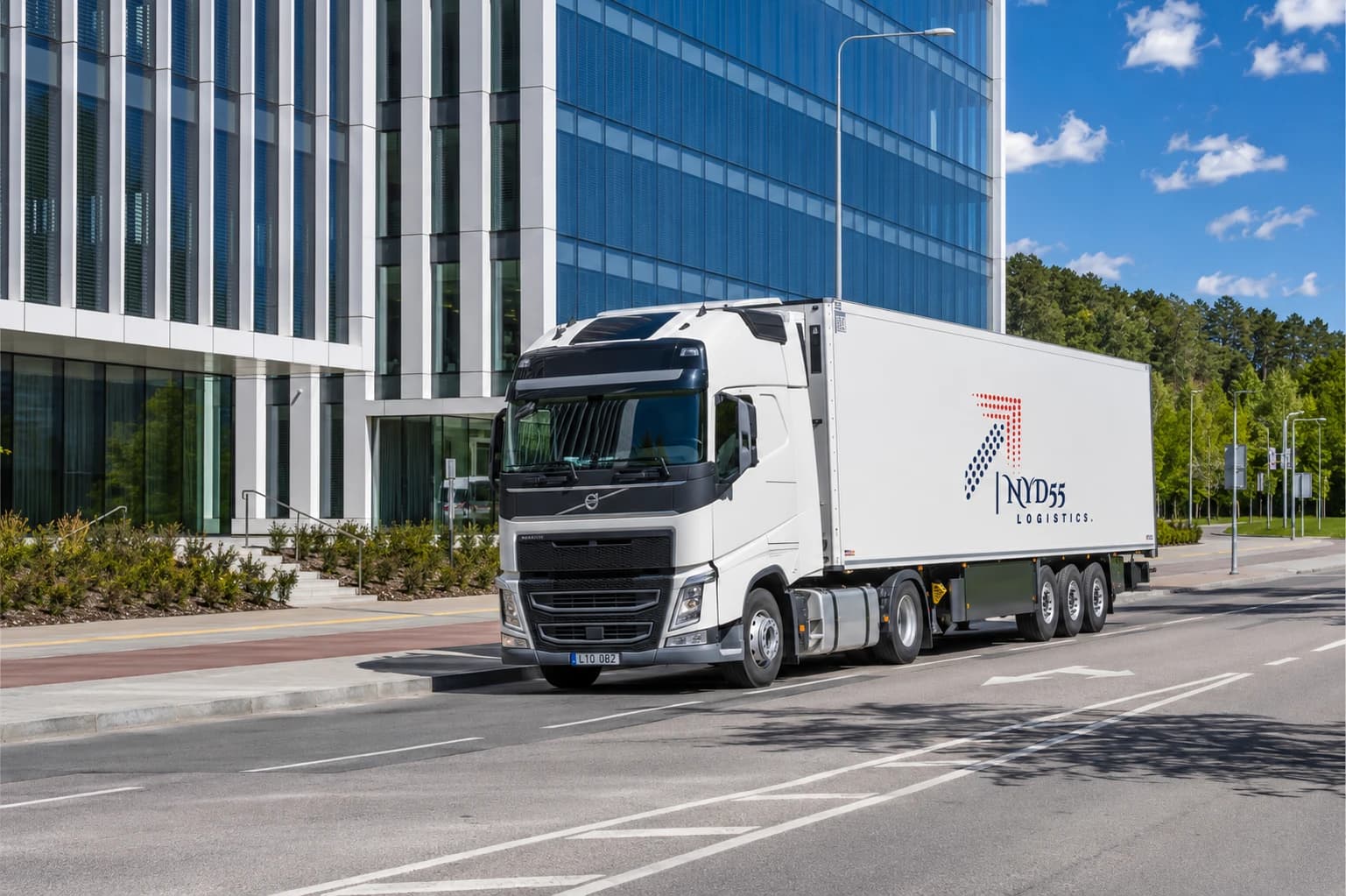 Image of an branded NYD55 Logistics Truck in front of a building